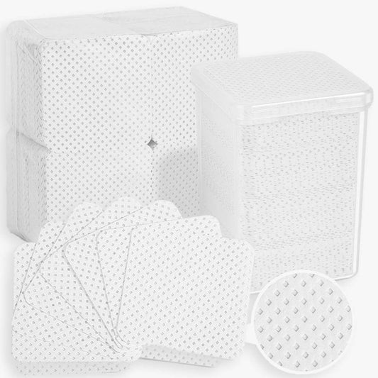 A box of white square nail wipes