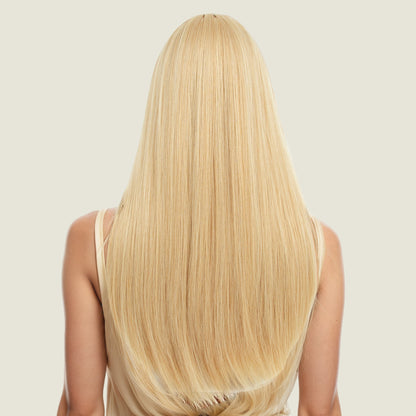 Layered collarbone-length wig with dyed bangs and realistic long straight hair