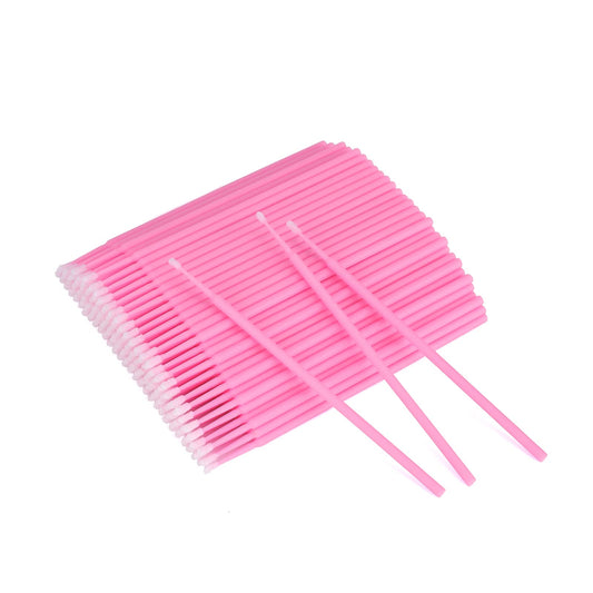 Neatly arranged pink micro brushes
